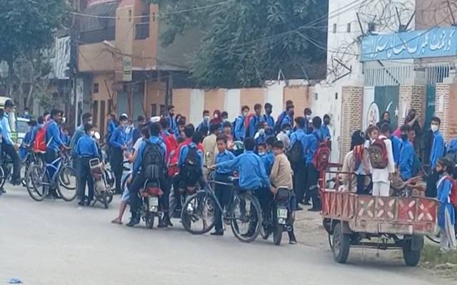 students standing outside the school