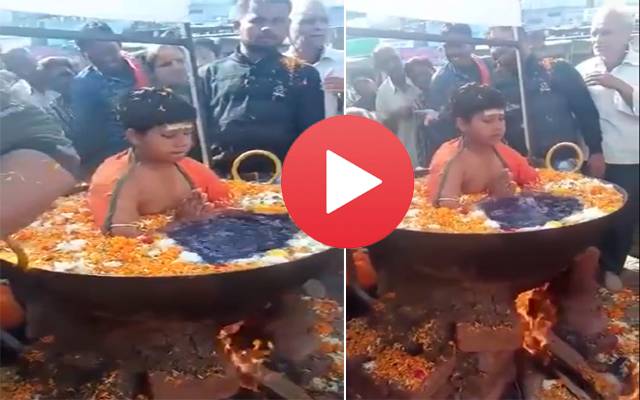 Boy Sitting Comfortably In Boiling Water