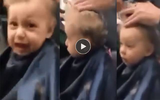بال کٹواتے رونے والے بچے کو چپ کرانے کا دلچسپ طریقہ کام کرگیا؛ ویڈیو وائرل