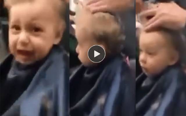 بال کٹواتے رونے والے بچے کو چپ کرانے کا دلچسپ طریقہ کام کرگیا؛ ویڈیو وائرل