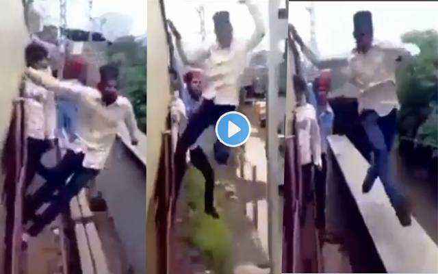Boy Attempts Dangerous Stunts on Moving Train