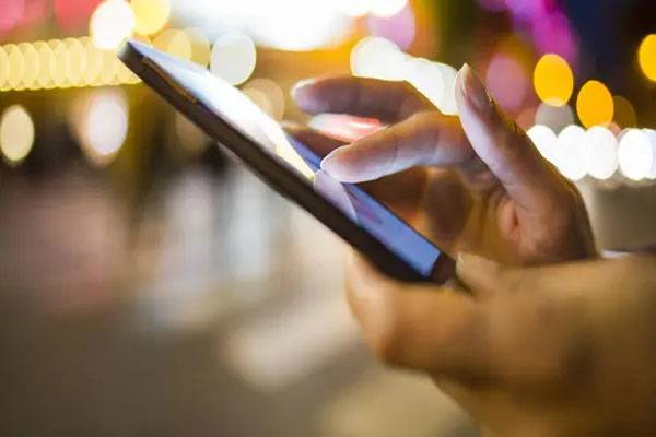 arab woman using smart phone