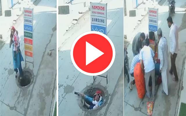 Woman falls into open main hole 