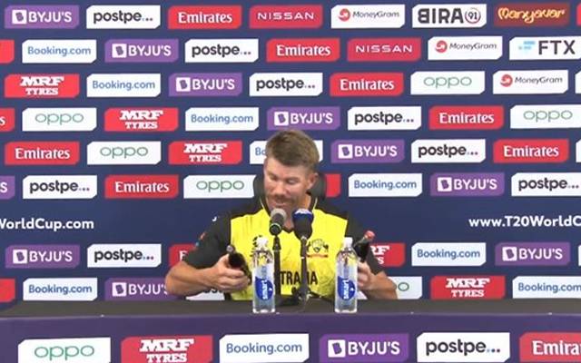 David Warner removes coca cola