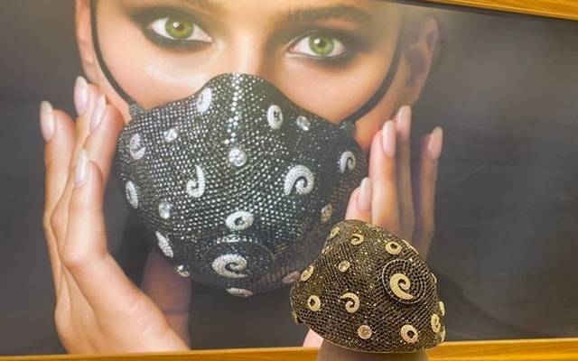 diamond and gold face mask