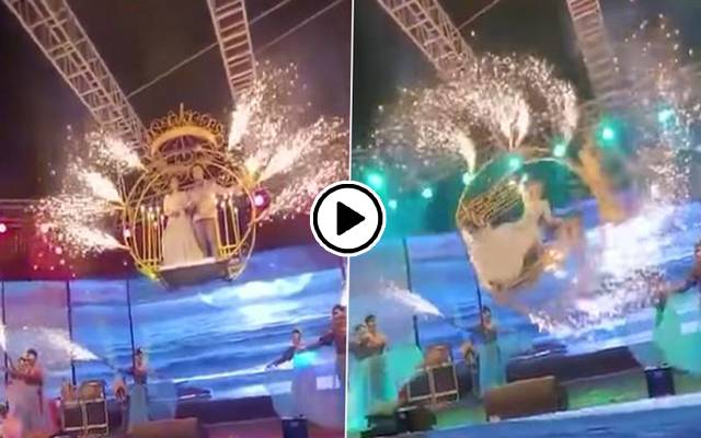 Bride and groom fall from a crane