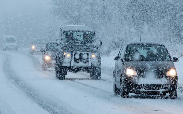 Caution while driving snow falling