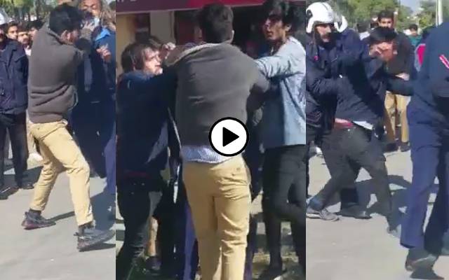 students fight with guards