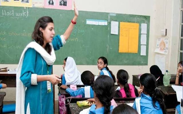 Teacher in class room
