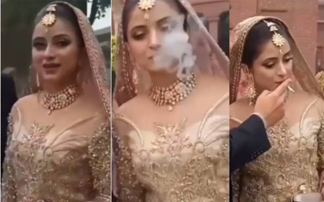 Girl smoking in bridal dress