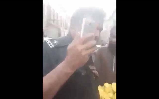 Asi, suspended,Kharadar threatning mango seller