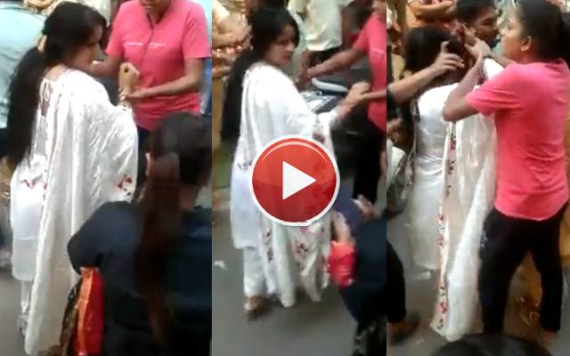 wife fight with husband in bazar, video viral