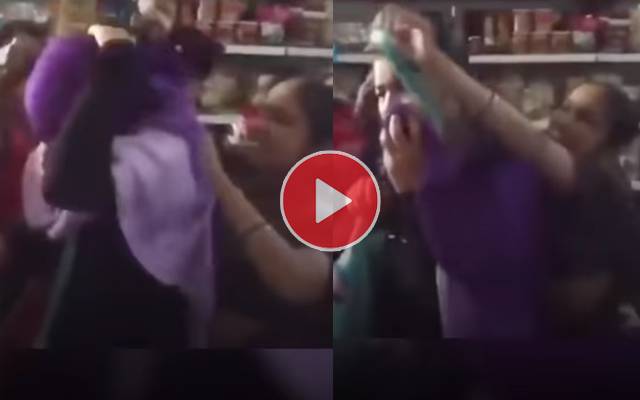 Female Staff at a Superstore blatantly and forcefully removing Hijab
